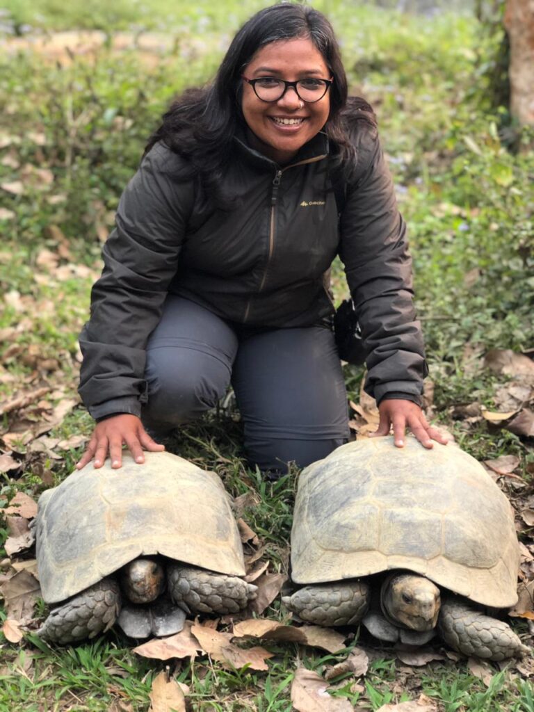 Sneha Dharwadkar in the field with tortoises